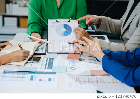 Business team collaboration discussing working analyzing with financial data and marketing growth report 123740470