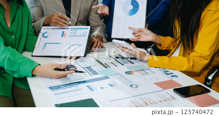 Business team collaboration discussing working analyzing with financial data and marketing growth report Business team collaboration discussing working analyzing with financial data and marketing growth report 123740472
