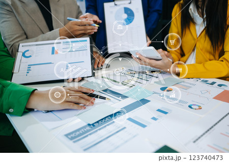 Working team meeting concept, business using laptop and smart phone and digital tablet computer with digital marketing media Working team meeting concept, business using laptop and smart phone and digital tablet computer with digital marketing media 123740473