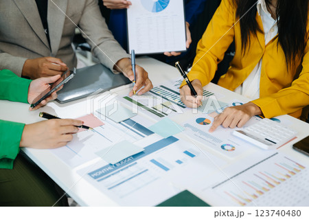 Business team collaboration discussing working analyzing with financial data and marketing growth report Business team collaboration discussing working analyzing with financial data and marketing growth report 123740480