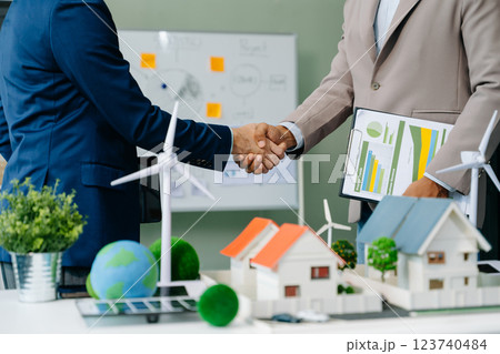 Business team people planning hand using laptop for working technology and business Net zero and carbon neutral concept.NET ZERO Business team people planning hand using laptop for working technology and business Net zero and carbon neutral concept.NET ZERO 123740484