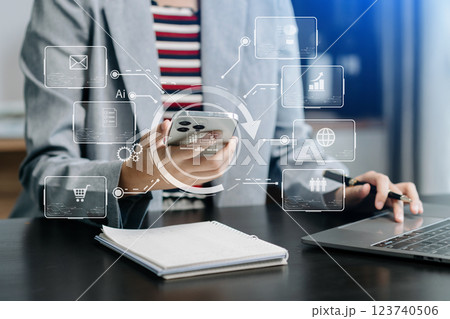 Digital marketing media in virtual screen.businesswoman hand working with mobile phone and modern compute 123740506
