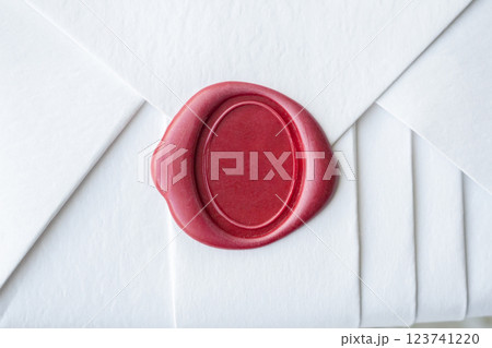 Wax seal stamp on white paper wrap packaging parcel box 123741220
