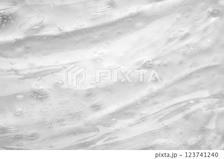 Transparent clear liquid serum gel cosmetic texture background Transparent clear liquid serum gel cosmetic texture background 123741240