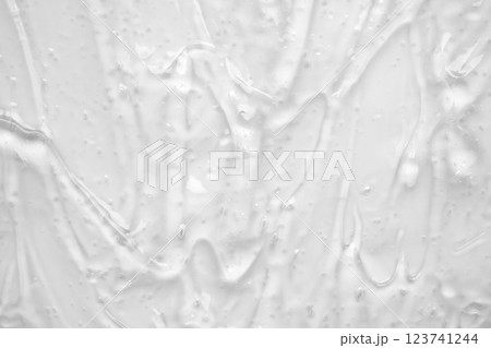 Transparent clear liquid serum gel cosmetic texture background Transparent clear liquid serum gel cosmetic texture background 123741244