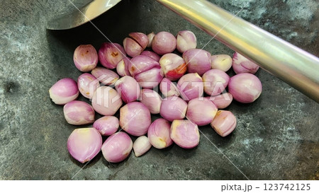 Fresh Shallots on Metal Surface Ready for Culinary Preparation 123742125