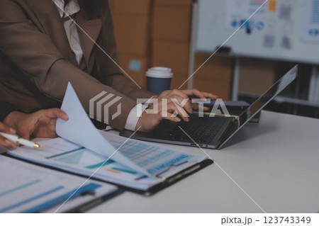 Accounting company provide finance and taxation planning for profitable cash flow, Auditor and accountant team working in office, analyze financial data and accounting record with calculator.Insight Accounting company provide finance and taxation planning for profitable cash flow, Auditor and accountant team working in office, analyze financial data and accounting record with calculator.Insight 123743349