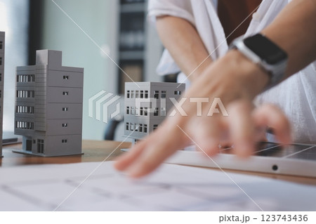 Discussion among businesspeople on the latest developments in solar cell panel technology and Solar Energy Environment city Concept. 123743436