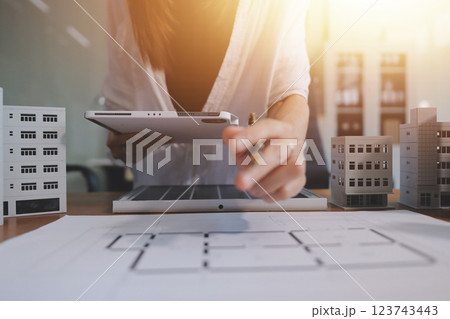 Discussion among businesspeople on the latest developments in solar cell panel technology and Solar Energy Environment city Concept. 123743443