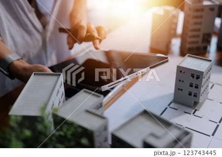 Discussion among businesspeople on the latest developments in solar cell panel technology and Solar Energy Environment city Concept. 123743445
