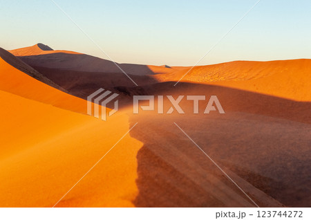 Climbing Dune 45 at sunrise Climbing Dune 45 at sunrise 123744272