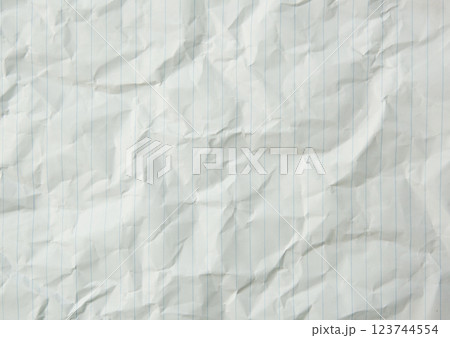 Rumpled lined sheet of paper isolated on white background 123744554