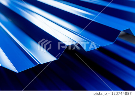 Blue metallic roof tiles background with drops of water. 123744887