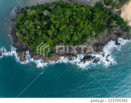 Bird eye view seashore with waves crashing on rock cliff,Beautiful waves sea surface in sunset time, Amazing seascape top view seacoast landscape view Bird eye view seashore with waves crashing on rock cliff,Beautiful waves sea surface in sunset time, Amazing seascape top view seacoast landscape view 123745382