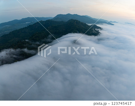Drone aerial view of landscape fog over mountains in sunrise sky,High angle view over countryside at Southeast asia,Phang Nga Thailand,Wide angle view nature landscape 123745417