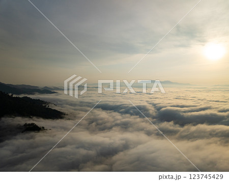 Drone aerial view of landscape fog over mountains in sunrise sky,High angle view over countryside at Southeast asia,Phang Nga Thailand,Wide angle view nature landscape 123745429