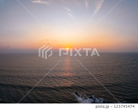 Aerial view sunset sky,Nature beautiful Light Sunset or sunrise over sea,Colorful dramatic majestic scenery sunset Sky with Amazing clouds and waves in sunset sky purple light cloud background 123745474
