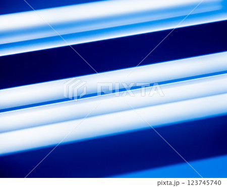 Blue metallic roof tiles background with drops of water. 123745740