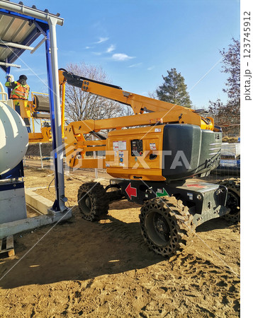 Heavy machinery involved in the process steel structure is under construction Heavy machinery involved in the process steel structure is under construction 123745912