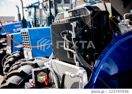 Modern new agricultural tractor engine. Machinery and equipment Modern new agricultural tractor engine. Machinery and equipment 123745936