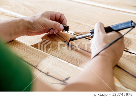 Carpenter with fibreboards at furniture factory workshop. Woodworking industry Carpenter with fibreboards at furniture factory workshop. Woodworking industry 123745979