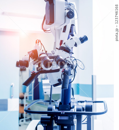 Modern microscope for operations in surgery room at the hospital. Modern microscope for operations in surgery room at the hospital. 123746168
