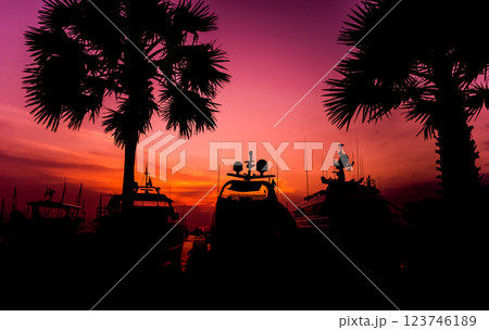 Beautiful sunset sky in the marina bay. View of harbor with yachts Beautiful sunset sky in the marina bay. View of harbor with yachts 123746189