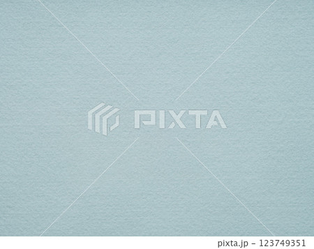 A serene aqua blue felt surface that calms the senses, evoking the tranquil essence of a gently flowing mountain stream 123749351