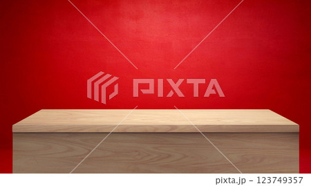 Beautiful empty wooden table, red wall background. 123749357