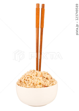 brown rice and barley bowl on white chopsticks brown rice and barley bowl on white chopsticks 123749589