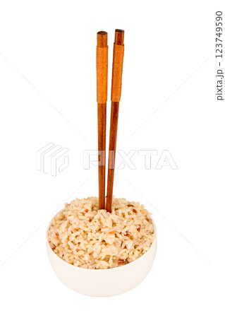 brown rice and barley bowl on white chopsticks brown rice and barley bowl on white chopsticks 123749590