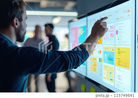 Detailed Interaction of Web Developer with Digital Interface in Modern Workspace Environment 123749891