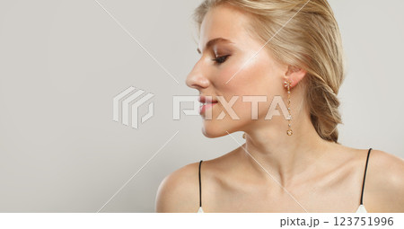 Blond model woman profile, portrait. Beautiful face with healthy clear skin, long shiny hair 123751996