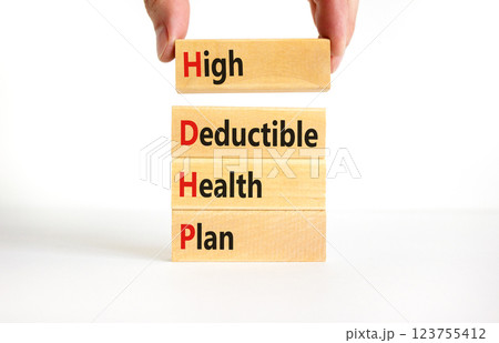 HDHP High Deductible Health Plan symbol. Concept word HDHP High Deductible Health Plan on beautiful blocks. Beautiful white background. Business HDHP High Deductible Health Plan concept. Copy space. 123755412