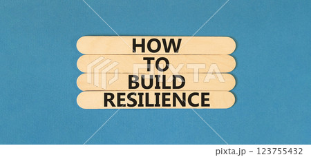 How to build resilience symbol. Concept words How to build resilience on beautiful wooden sticks. Beautiful blue table blue background. Business and how to build resilience concept. Copy space. How to build resilience symbol. Concept words How to build resilience on beautiful wooden sticks. Beautiful blue table blue background. Business and how to build resilience concept. Copy space. 123755432