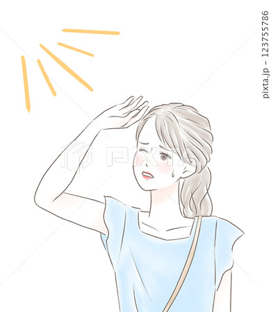 太陽に手をかざして眩しそうにお出かけする女性 123755786