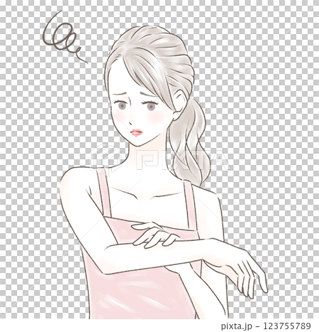 A woman in a camisole with a troubled look on her face touching her tanned arms, ponytail A woman in a camisole with a troubled look on her face touching her tanned arms, ponytail 123755789