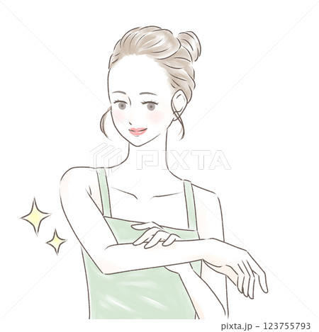 すべすべになった腕を触り喜ぶキャミソールの女性　お団子の髪型 123755793