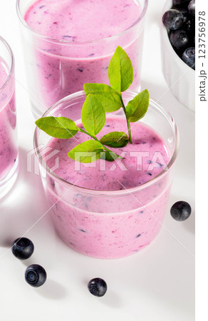Refreshing healthy blueberry smoothie with mint, fresh wild berries bowl. Superfood and antioxidant. Refreshing healthy blueberry smoothie with mint, fresh wild berries bowl. Superfood and antioxidant. 123756978