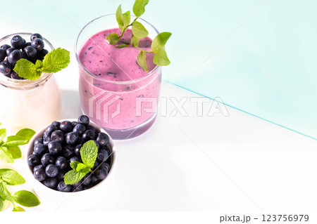 Balanced morning nutrition. Healthy breakfast with yogurt, blueberry smoothie, blueberry Copy space Balanced morning nutrition. Healthy breakfast with yogurt, blueberry smoothie, blueberry Copy space 123756979