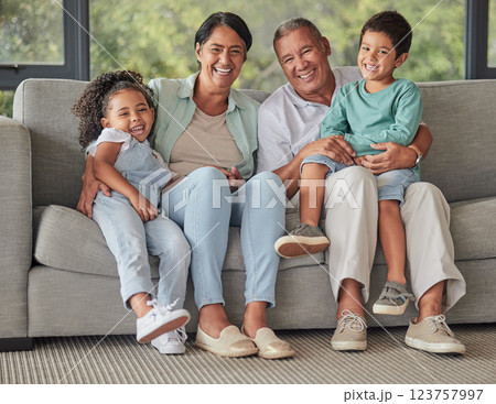Grandparents, children and sofa happy in home living room on vacation or holiday together. Kids, grandma and grandpa in retirement smile on couch in lounge with love for family portrait in house Grandparents, children and sofa happy in home living room on vacation or holiday together. Kids, grandma and grandpa in retirement smile on couch in lounge with love for family portrait in house 123757997