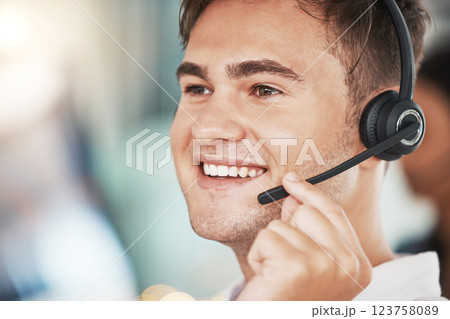 Call center, happy sales man and customer service worker consulting, microphone telemarketing and working in office. Face of smile contact support consultant, crm communication and agency help desk 123758089