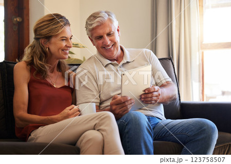 Home, digital tablet and senior couple with website information, video subscription service or surfing social media app on sofa together. Elderly people networking or online retirement house planning 123758507