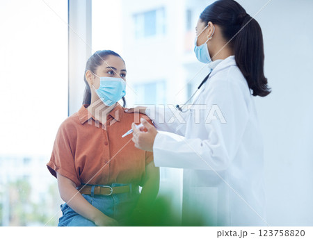 Covid, health and patient vaccine of a doctor consulting a woman in a hospital or clinic office. Healthcare consultant and employee working and helping with medicine and medical advice for dengue Covid, health and patient vaccine of a doctor consulting a woman in a hospital or clinic office. Healthcare consultant and employee working and helping with medicine and medical advice for dengue 123758820