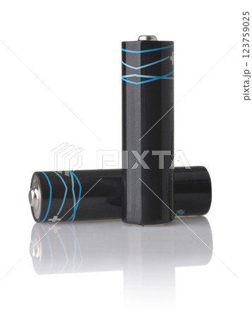 Front view of  two black AA alkaline batteries 123759025