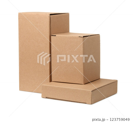 Three different brown cardboard boxes Three different brown cardboard boxes 123759049