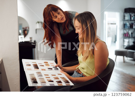 Salon small business hairdresser, color hair and consultation with client for trust, advice and professional care. Dye swatch portfolio hairstylist entrepreneur consulting with customer for startup 123759062