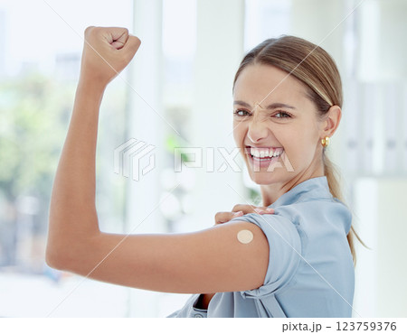 Woman, covid vaccine or band aid on flex arm in power, strength or support of Australian hospital injection. Happy smile portrait of patient and plaster in global virus security or safety wellness Woman, covid vaccine or band aid on flex arm in power, strength or support of Australian hospital injection. Happy smile portrait of patient and plaster in global virus security or safety wellness 123759376