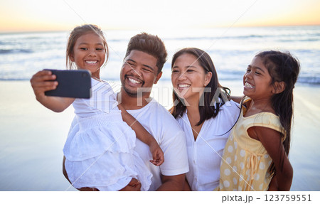 Family selfie, happy beach and parents on ocean holiday with children in Cancun and smile for international vacation by the sea. Girl siblings taking photo on phone with mother and father in nature Family selfie, happy beach and parents on ocean holiday with children in Cancun and smile for international vacation by the sea. Girl siblings taking photo on phone with mother and father in nature 123759551