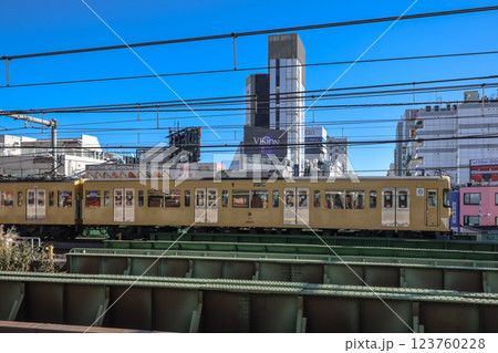 Urban Cityscape Featuring a Yellow Train, shin okubo Dec 10 2024 Urban Cityscape Featuring a Yellow Train, shin okubo Dec 10 2024 123760228